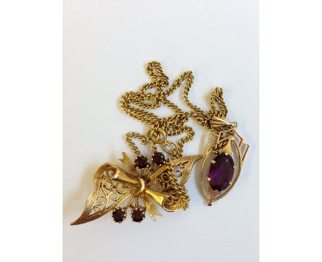An unmarked gold and garnet set Victorian brooch together with an amethyst set 9 carat gold pendant necklace.