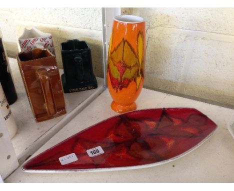 A Poole Pottery Delphis vase, shape 15, decorated in an abstract pattern on orange ground together with a shape 82 spear dish