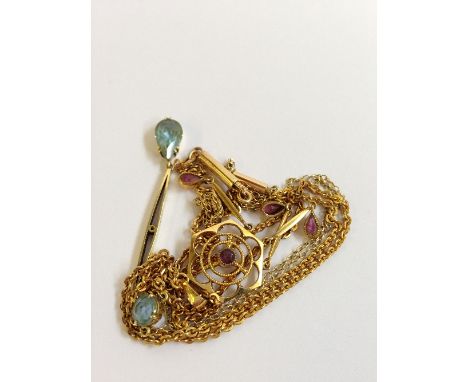 An amethyst set gold pendant necklace together with another.