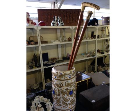 A Georgian or Queen Anne walking stick with pique inlaid ivory handle with silver collar, eyelet holes and inscribed with ori