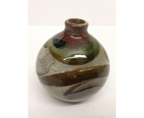A Poole Pottery Atlantis small squat bulbous shape vase by Catherine Connett, decorated in multi coloured glazes.
(Ref 33)