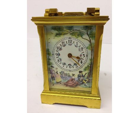 A 19th century style brass and glass cased carriage clock with enamel sides and face decorated in the French style by Deacon,