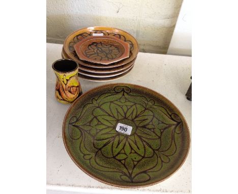 A Poole Pottery Aegean plate, decorated in an abstract green pattern together with six other Aegean items.