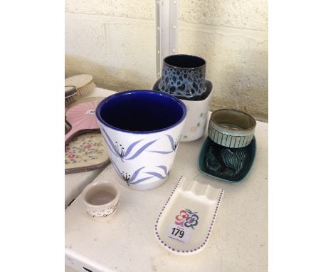 Seven various Poole Pottery items.