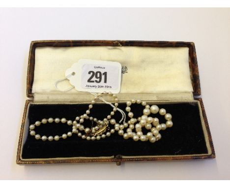 A pearl necklace with 9 carat gold and diamond clasp (one diamond replaced).