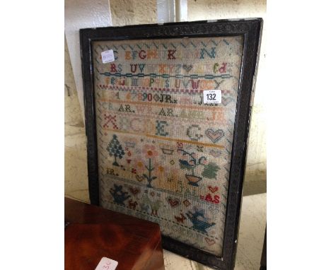 A framed and glazed 19th century sampler.