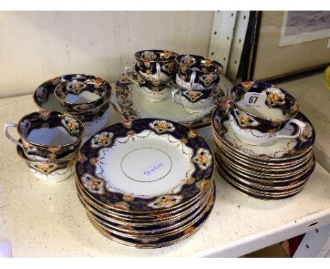 The residue of an early 20th century Royal Vale china tea service decorated in an Imari pattern.