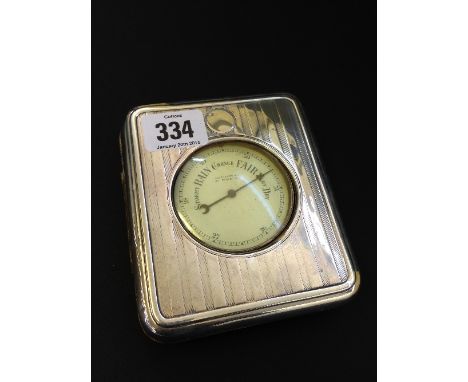 A silver and leather cased portable barometer.
(Ref 5)