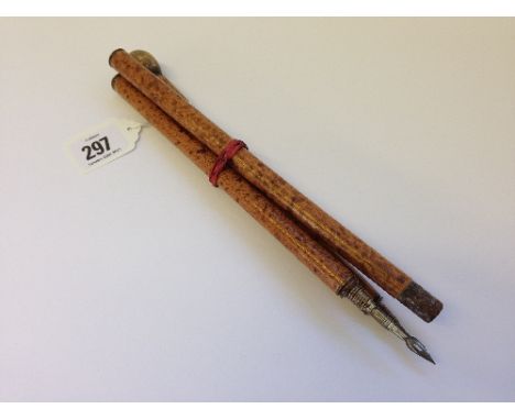 An unusual three piece small wooden walking stick concealing pen and pencil with screw together action.