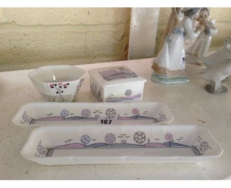 Four various Poole Pottery bone china items, decorated in the Trelissick and Athena patterns.