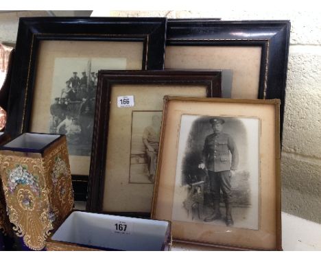 A collection of five framed and glazed black and white Military and other service related portrait and group photographs.