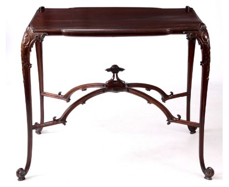 AN 18TH CENTURY FIGURED MAHOGANY CHINESE CHIPPENDALE SILVER TABLE with finely carved shell and C scroll cabriole legs and scr