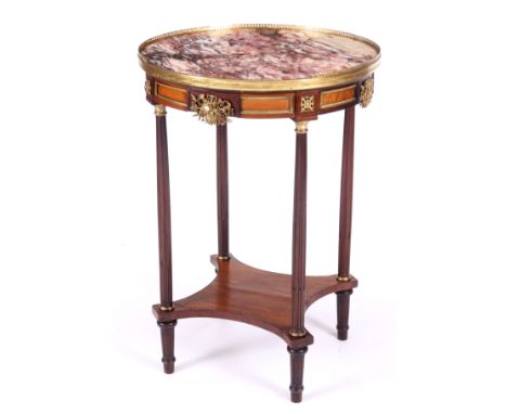 A LOUIS XV STYLE CIRCULAR ORMOLU MOUNTED MARBLE TOP MAHOGANY OCCASIONAL TABLE the purple-veined marble top with brass gallery