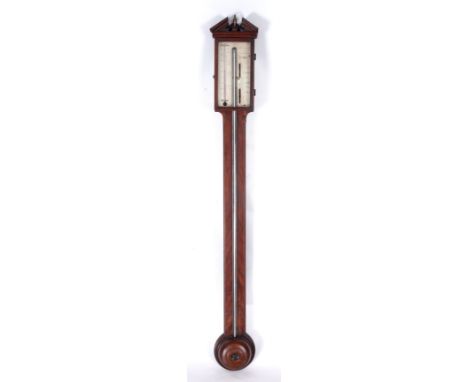 JOSEPH VEDUSSY & Co. MANCHESTER. A GEORGE III MAHOGANY STICK BAROMETER with architectural pediment above hinged door and slim