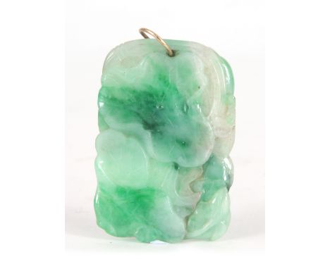 A CHINESE CARVED JADE PENDANT of rectangular form with leaf work decoration 55mm long&nbsp;