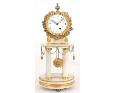 AN EARLY 19th CENTURY ENGLISH WHITE MARBLE AND ORMOLU FUSEE MANTEL CLOCK with engine turned bezel surrounded by applied acant