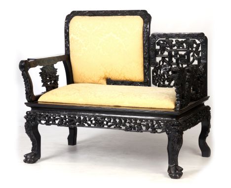 A GOOD 19TH CENTURY CHINESE HARDWOOD UPHOLSTERED BENCH with finely carved floral and leafwork pierce work decoration and Drag