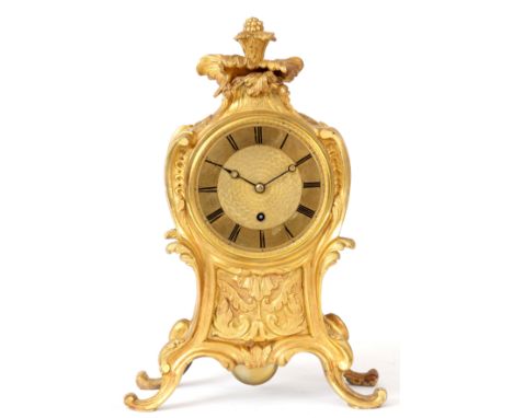 BARWISE, LONDON. A REGENCY ORMOLU ENGLISH FUSEE MANTEL CLOCK with scrolled leafwork and floral decoration enclosing a 4" gilt