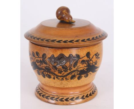 A MID 19TH CENTURY EUROPEAN FRUITWOOD CYLINDRICAL TEA CADDY with ink decorated front and carved pear finial 12cm diameter&nbs