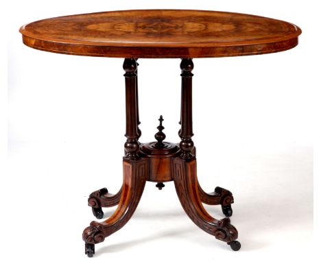 A SMALL LATE 19TH CENTURY OVAL YEW-WOOD CROSSBANDED AND INLAID FIGURED WALNUT BREAKFAST TABLE having a quarter veneered top a