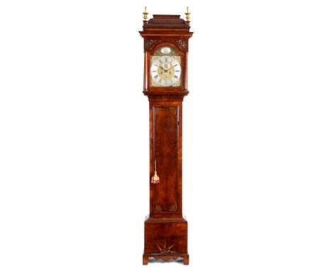 JOSEPH WINDMILLS, LONDON A FINE EARLY 18th CENTURY FIGURED WALNUT 8-DAY LONGCASE CLOCK with caddy top and pierced sound frets