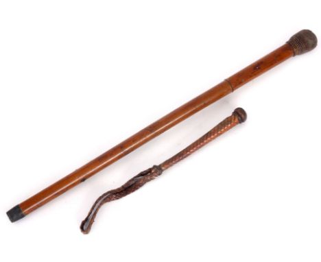 AN EARLY 19TH CENTURY MALACCA SWORD STICK/COSH WITH RATTAN HANDLE GRIP, having a steel square tapering fuller sectional blade