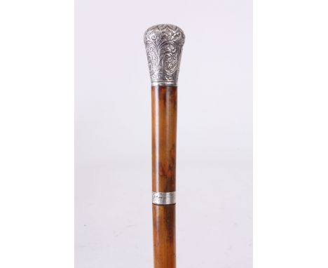 A MID 19TH CENTURY MALACCA SILVER MOUNTED SWORD STICK with repousse work handle and double-sided steel blade 90cm high.Condit