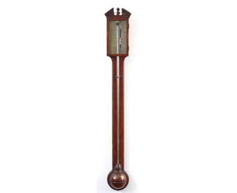 THOMAS JONES, 62 CHARING CROSS, LONDON. A GEORGE III MAHOGANY STICK BAROMETER with architectural pediment above a hinged glaz