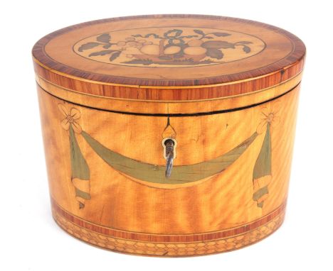 A LATE GEORGE III OVAL SHAPED FIGURED KINGWOOD CROSS-BANDED SATINWOOD INLAID&nbsp;TEA CADDY with hinged&nbsp;basket of fruit 