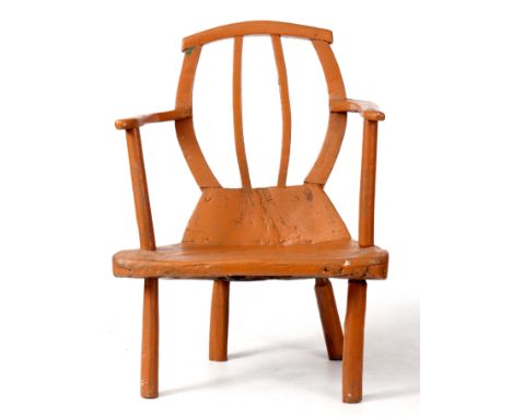 AN UNUSUAL 18TH CENTURY WEST HIGHLAND SCOTTISH PAINTED COMB BACK ARMCHAIR with dugout branch work seat, comb back with open s