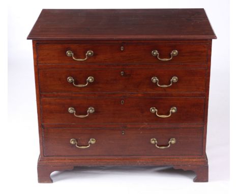 A GEORGE III MAHOGANY CHEST OF DRAWERS with moulded edge top above four graduated drawers with fitted swan-neck handles; stan