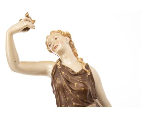 ROYAL WORCESTER FIGURE OF A CLASSICAL MAIDEN, modelled leaning against a tree stump caressing a dove, on a naturalistic base,