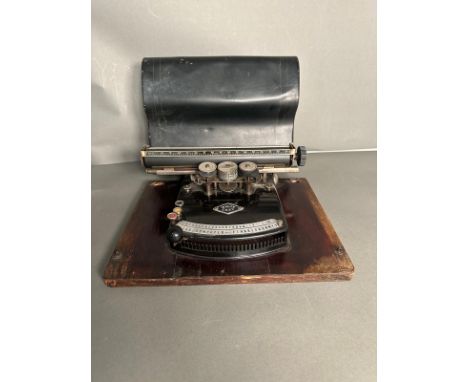 A 1920's German "Write Easy" typewriter by Gunda-Werk for the Uk in original case 