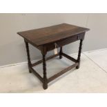 A 17th century Cromwellian rectangular oak single drawer bobbin leg side table, width 91cm, depth