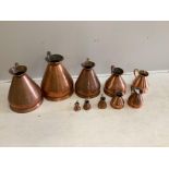 A matched graduated set of ten late 19th / early 20th century copper haystack measures, four gallons