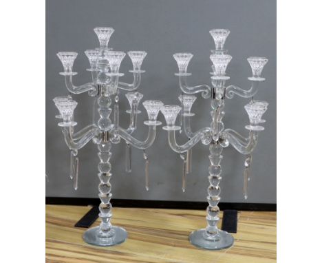 A pair of modern eight branch, nine light lustre candelabra, 63cm high