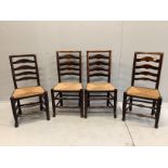 A set of four 18th century rush seat, ladder back dining chairs, width 46cm, depth 38cm, height