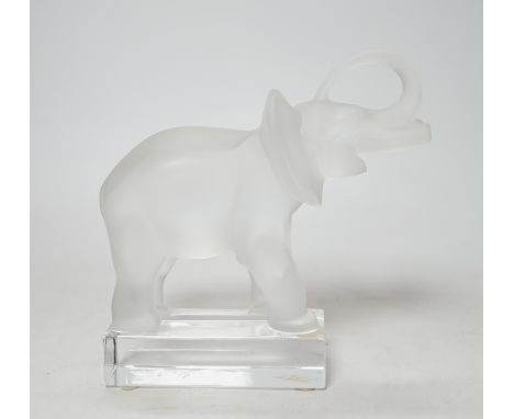 A Lalique frosted glass model of an elephant, signed to the base, 16cm high Good condition, no damage seen.
