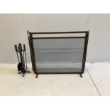 A spark guard, minimum width 90cm, depth 18cm, height 80cm and fire irons in antique distressed