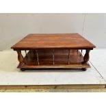 A rectangular brass mounted mahogany two tier coffee table, width 122cm, depth 91cm, height 48cm