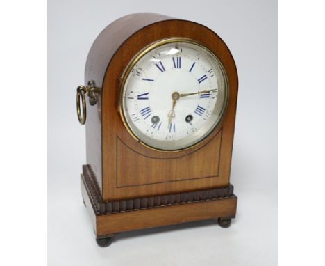 A late 19th century mahogany mantel clock with enamelled Roman numeral dial, 30cm high