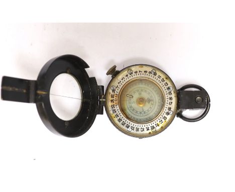 A T.G. & Co military compass MKIII, 1940The compass is in generally good condition with some surface wear and losses to paint