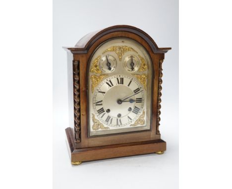 An early 20th century mahogany chiming bracket clock with silvered Roman numeral dial, 34cm high