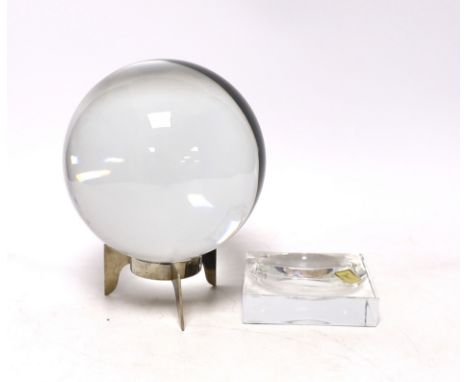 A large Baccarat glass crystal ball with two Baccarat stands, 16cm high The ball with two areas with light (but noticeable ) 