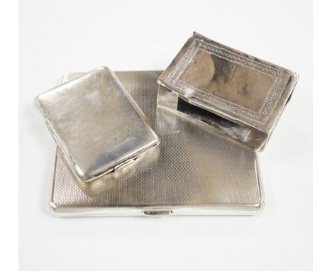A George V engine turned silver cigarette case, Walker &amp; Hall, London, 1935, 10.2cm and two matchbox holders, one silver.