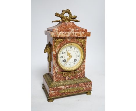 A mid-19th century rouge marble mantel clock, L. Marti et Cie Medaille D’argent two train movement, striking on a bell (bell 