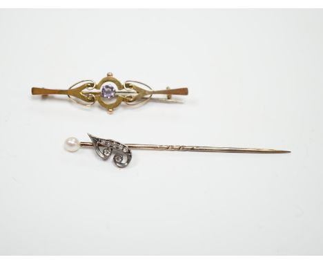 An early 20th century diamond chip and seed pearl set initial stick pin, 65mm and a 9ct and gem set brooch.