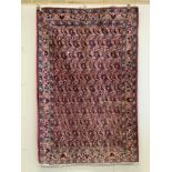 A North West Persian red ground Boteh rug, 203 x 134cm