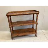 A late Victorian oak three tier buffet, width 99cm, depth 40cm, height 100cm