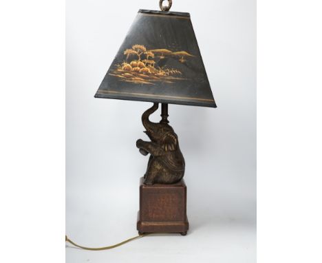 A bronzed elephant table lamp with chinoiserie shade, 65cm high